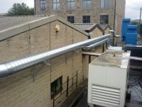 Metal on side of building